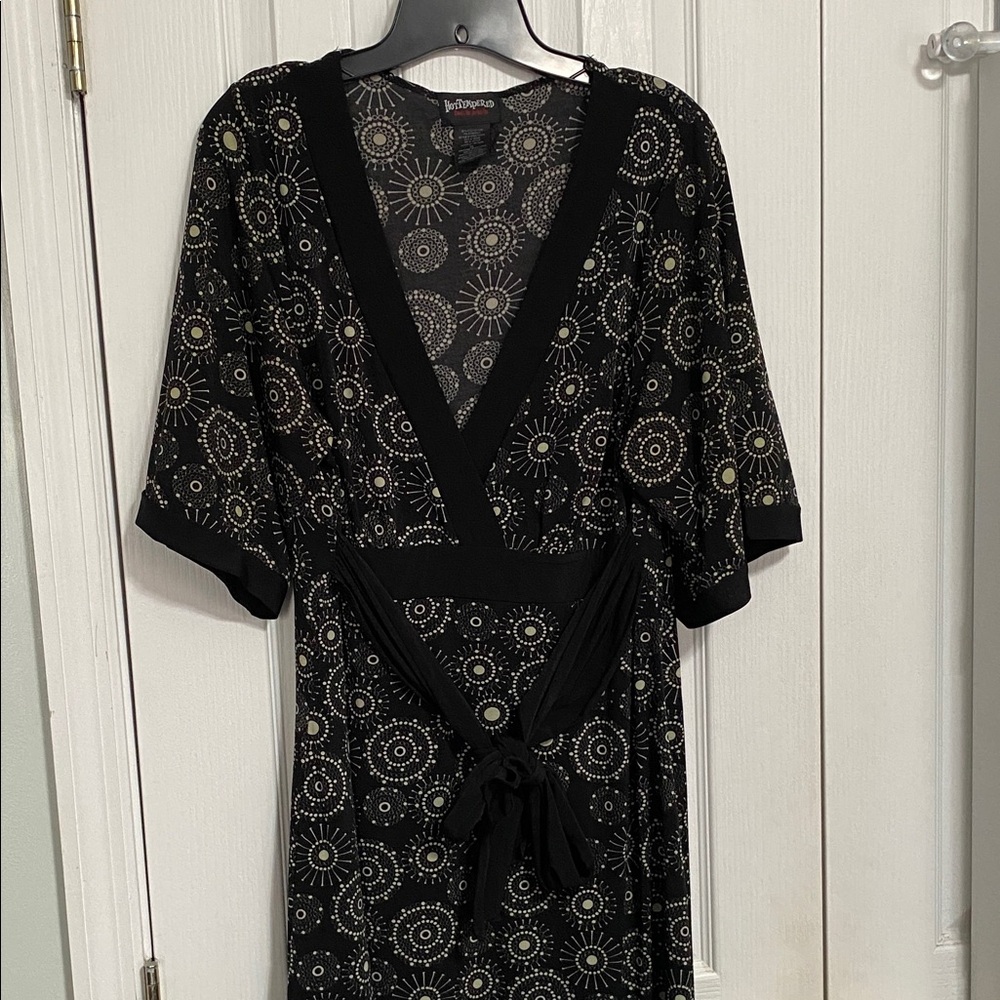 Woman’s Black and White Patterned Midi Dress